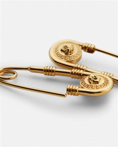 men versace stud earrings|Versace safety pin earrings.